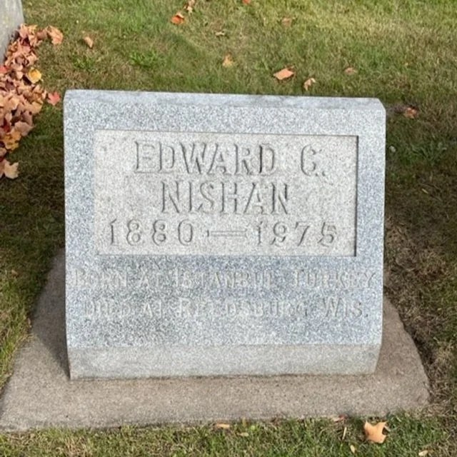 A real pale granite headstone after gentle hand cleaning